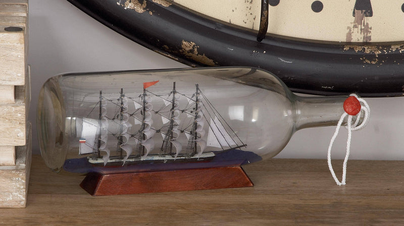 A-71642: GLASS SHIP IN A BOTTLE 13"W, 5"H